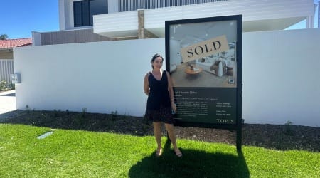 Hilary with sold sign