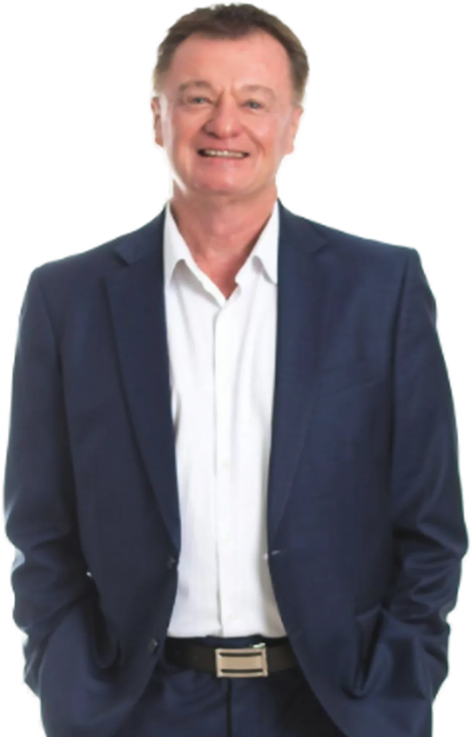 Bob Andersen, Property Mastermind property development mentor, in a navy suit with his hands in his pockets