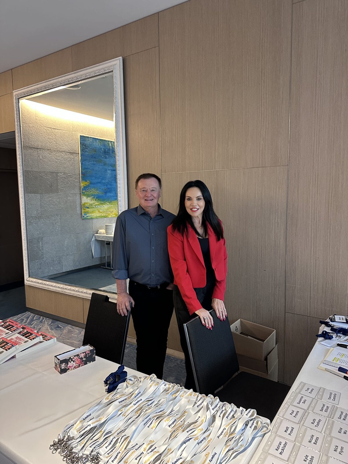 Bob Andersen and Hilary Saxton welcoming attendees at check-in