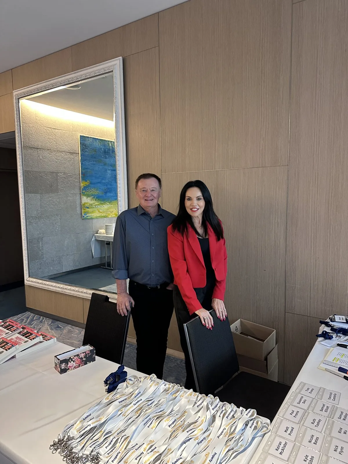 Bob Andersen and Hilary Saxton welcoming attendees at check-in