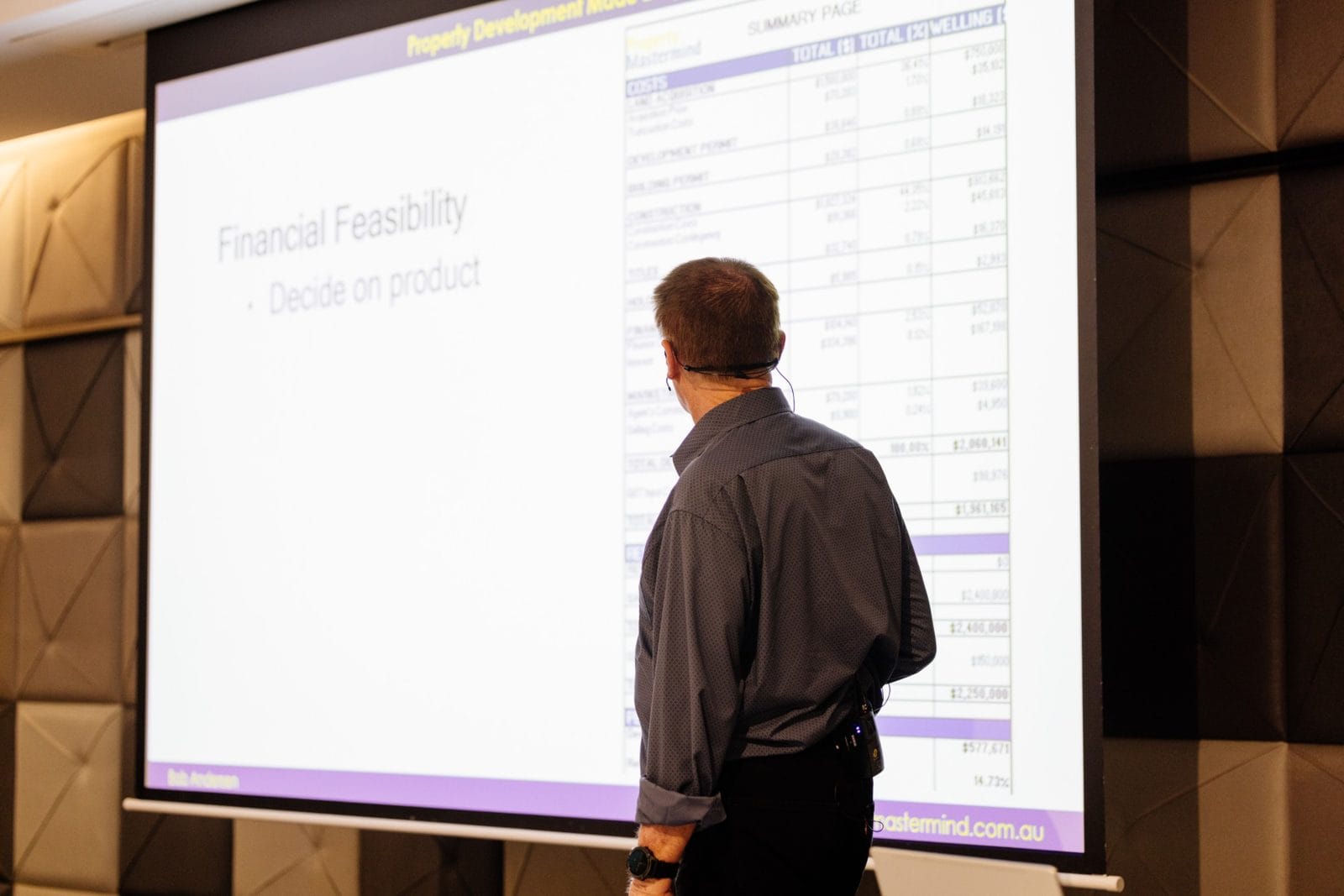 Bob Andersen walking the room through a live financial feasibility