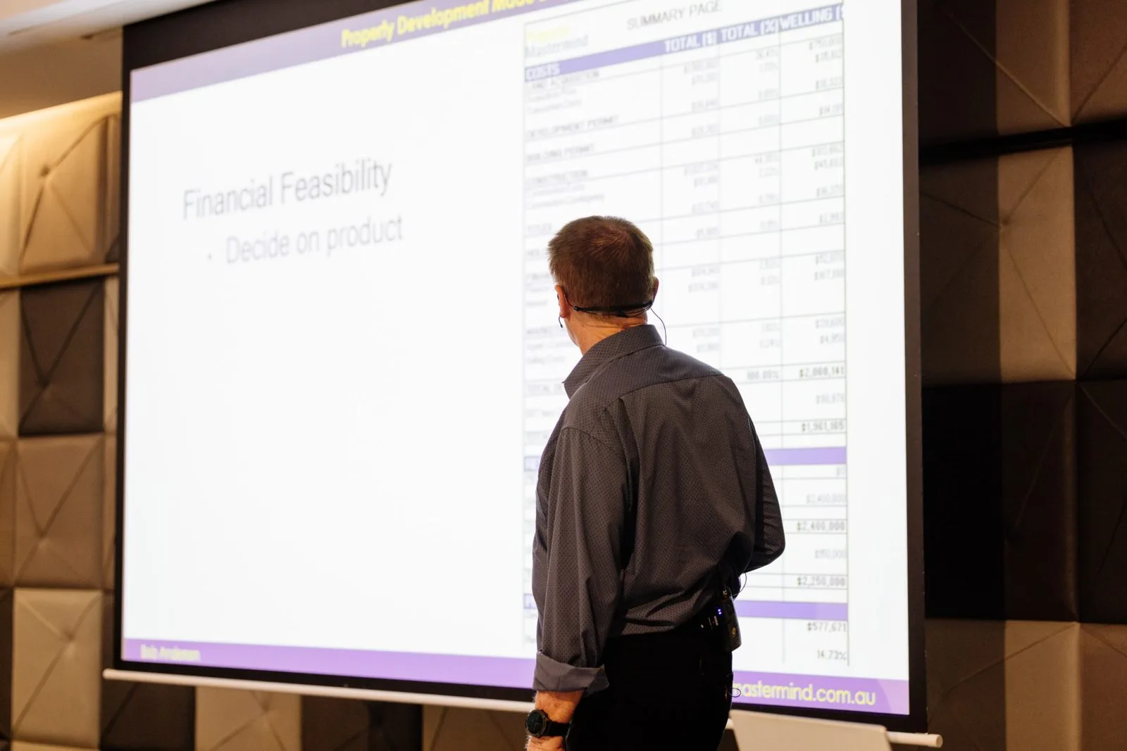 Bob Andersen walking the room through a live financial feasibility