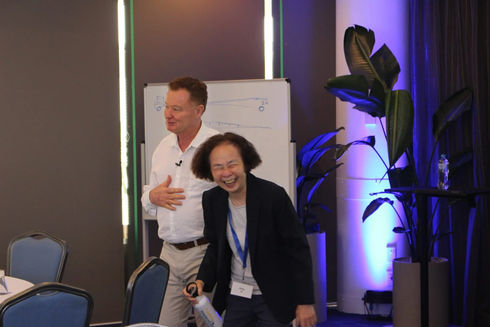 Bob Andersen sharing a laugh with an attendee at a previous workshop